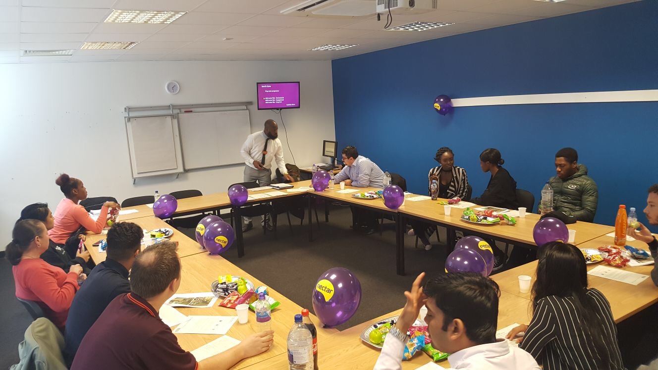 Leon presenting a workshop to a full room